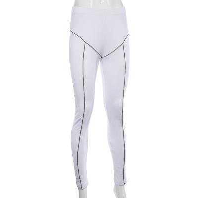 China Dropshipping Anti-Static Apparels Women's Sports Style Line Contrast Color Reflective Mark Elastic Waistband Buttocks Slim Pants Canter for sale