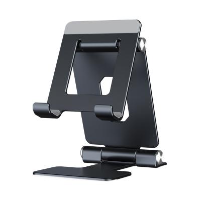 China Aluminum Alloy Adjustable Universal Stand Holder Portable Vertical Foldable Phone Desk Stand for sale