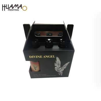 China Recycled materials wholesale gold foil logo wine box bottle packaging stain UV black matte corrugated wine ad box for sale