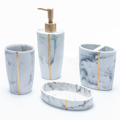 China 2022 Sustainable New Arrival Modern Home Decor 4 PCS Bath Sets Bathroom Accessories Set Resin for sale