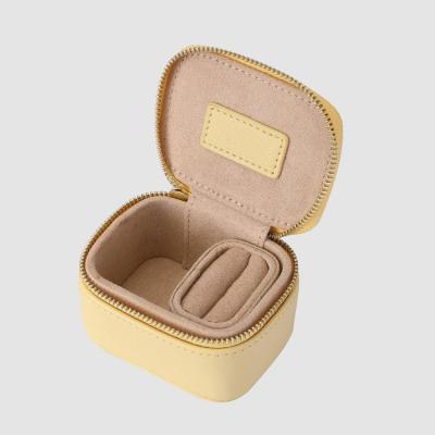 China Mini PU Jewelry Storage Box Custom Logo Small Travel Leather Jewelry Storage Box PU Jewelry Ring Ring Jewelry Box With Zipper for sale