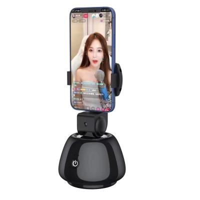 China 2022 New Technology Portable Smart Shooting AI Authomatic Adjustable Zoom 360 Automatic Rotation Object Tracking Cell Phone Holder for sale