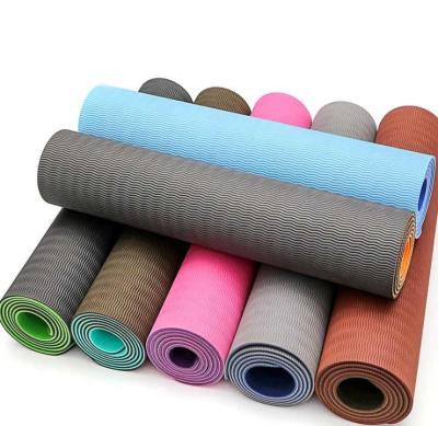 China Eco-friendly Soft Comfortable 183*61*0.6 Cm Non Slip Multi Color Printed Strip Yoga Mat for sale