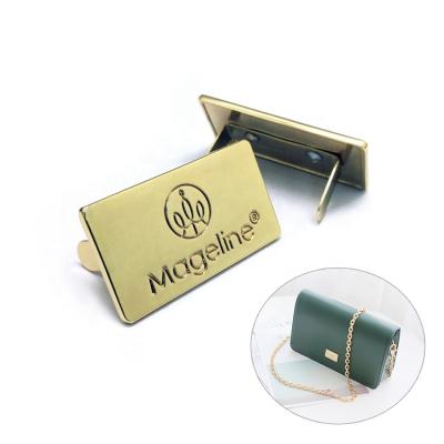 China Metal logo plate for leather bags OEM ODM handbag logo plate/handbag custom metal logo tag for leather bags for sale