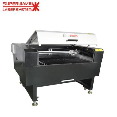 China Gap Laser Cutting Machine CO2 Cut For Acrylic Leather Wood Engraving And CO2 Laser Cutting Machine for sale