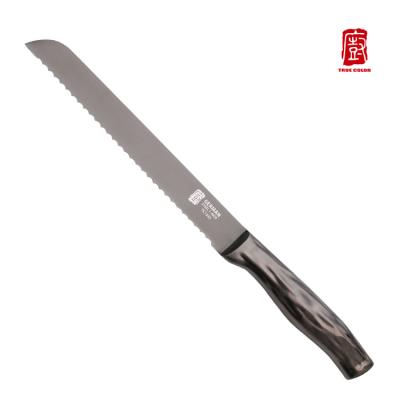 China Hot Selling Amazon Stocked Stainless Steel Kitchen Knife Serrated Bread Knife with Hollow Handle and Titanium Coating for sale