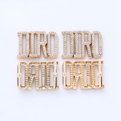 China Viable custom clothes women lingerie metal tags gold label and gold plated metal hollow label eyeshadow palette for sale