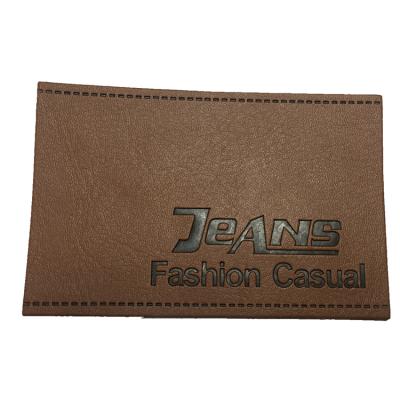 China Viable Custom Logo Embossed Faux Leather Label Jeans PU Leather Patch for sale