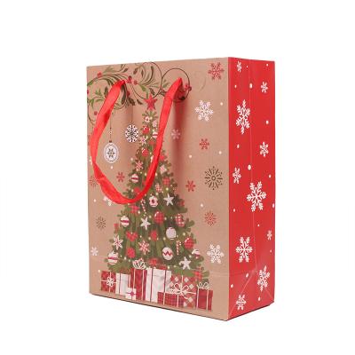 China Recyclable High Quality Promotional Christmas Santa Claus Gift Paper Bag Candy Packaging Shopping Bag for sale