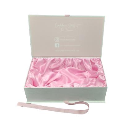 China OEM Luxury Handmade Gift Box Paper Magnetic Gift Packaging Rigid Boxes With Accessories Pink Ribbon Satin For Wig Box for sale