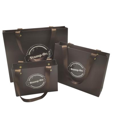 China Recyclable Customize Brown Paper Shopping Bag With Ribbon To Handle Luxury Boutique Bags For Brand Clothing Custom Tote Bag for sale