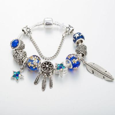 China Beauty Environmentally Friendly European Bracelet With Large Vintage Alloy Pendant Blue Hole Beaded Bracelet Feather Bracelet Wholesale for sale