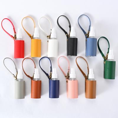 China New Hot Selling Custom Multicolor Wholesale Eco-friendly Material Vacuum Spray Bottle PU Leather Ornament Leather Pendant Keychain for sale