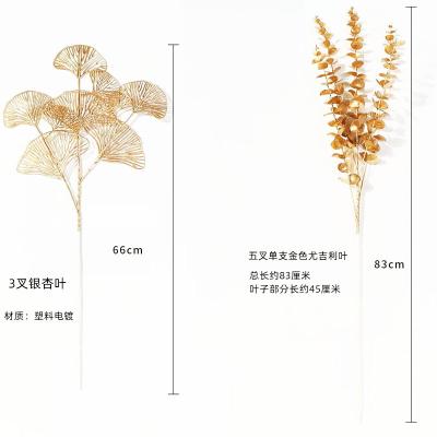 China Minimalist Artificial Gold Eucalyptus Plastic Flowers for Wedding Home Decoration Wholesale Hot Sale for sale