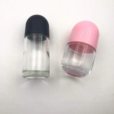 China Personal Care 50ml Essential Oil Bottle With Glass Ball Cap Plastic Ball On Glass Bottle for sale