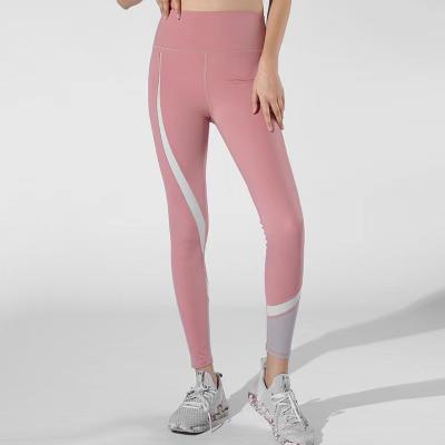 China 2021 New Yoga Women's Quick Drying Fitness Women's Elastic Tight Waist High Waist High Breathable Hip Lifting Slim Sports Pants for sale