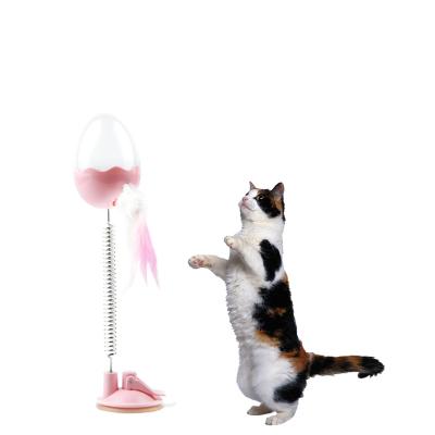 China High Quality Viable 3 in 1 Cat Toy with Sucker Spring Feather Leak Funny Pet Toys, Flashing Bell Cat Toy Dog Rocker Swings Spring for sale