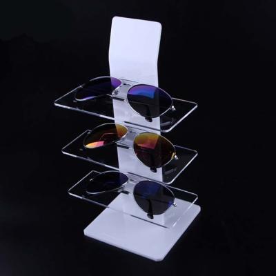 China Eco-friendly Shop Counter Showcase Decorative Desktop Acrylic Glasses Show Stand Glass Display Stand for sale