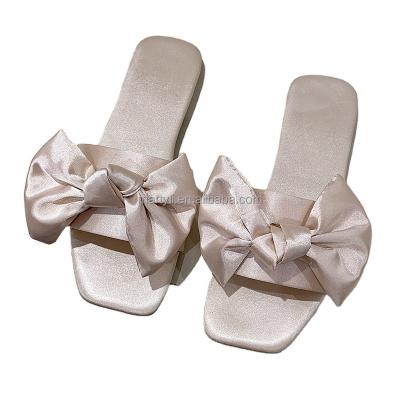 China New Flat Women's Flat Women's Shoes Bowknot Square Toe Low Heel Satin Slippers Wedding Sandals for sale