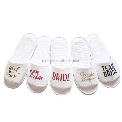 China Custom Made Luxury Disposable Round Logo White Open Toe Women's Team Bride Slippers Wedding Bridesmaid for sale