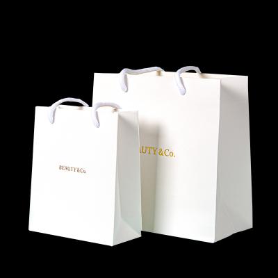 China Handmade Luxury Gift Bag Custom Paper Packaging Shopping Bag / Paper Bag For Clothing for sale