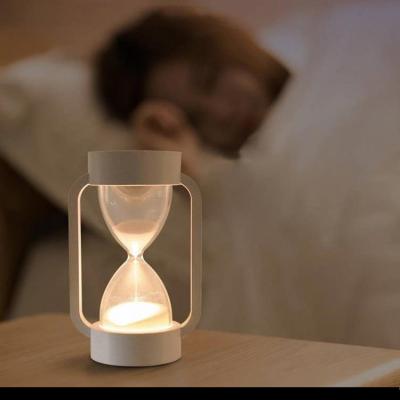 China Amazon USB Explosion Color Hourglass LED Hourglass Time Gravity Sensor Night Light Timer Atmosphere Light for sale