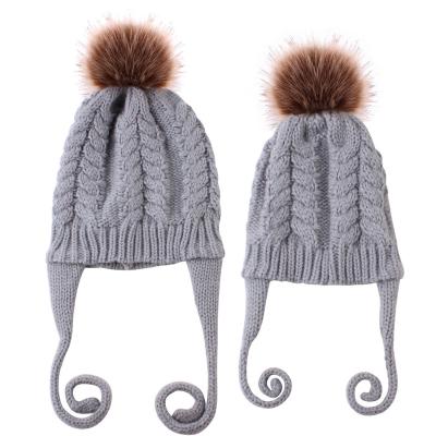 China breathable & YANGTONG parent-ChildHigh quality matching long size double waterproof fur pompom hats for mommy and me beanie knitted for sale