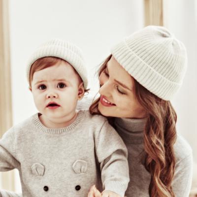 China breathable & Wholesale YANGTONG Waterproof Parent-child winter beanies kids and women logo patch hat leather beanie for custom logo for sale