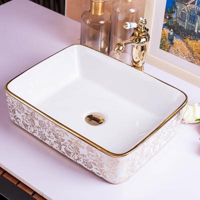 China Bathroom Sinks Mussive Gold Rectangular Luxurious Artistic Hand Wash Ceramic Face Basin Bathroom Sink for sale