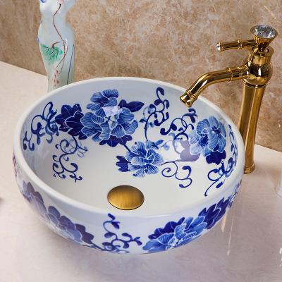 China Hand Thrown Blue And White Ceramic Artistic Hand Wash Sink Basin for sale