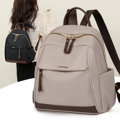 China Waterproof Ladies backpacks 2023 women's new street fashion simple computer bag large capacity travel backpack wholesale for sale