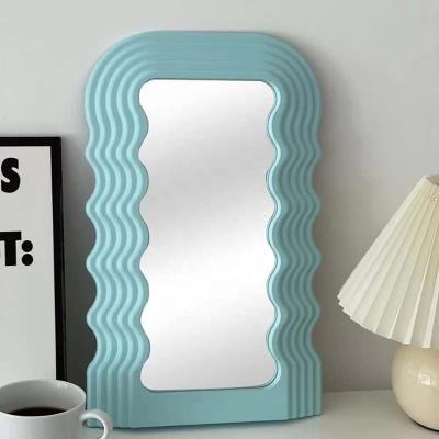 China Lighted Cosmetic Mirror 16*10 Inch Wavy Mirror Desktop Mirror With Irregular Wave Frame Aesthetic Wall Mounted for sale