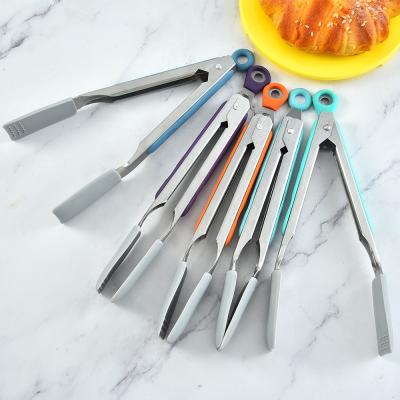 China Sustainable Food Grade Silicone Multifunctional Staples GRILL Staples Food Tongs for Kitchen and Baking for sale