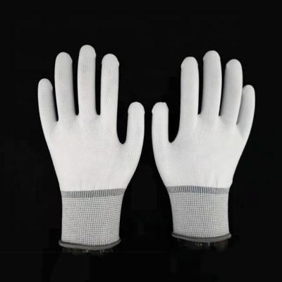 China Nylon Anti-Slip PU Dipped Dmf Free Running Gloves For Construction for sale