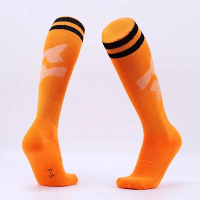 China Breathable New design thickened knee high cotton anti-slip football socks long adults children socks for sale