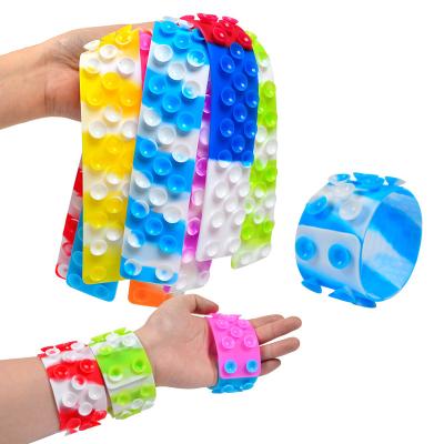 China Relieve stress popular relife bracelet suction toy snapper fidgety silicone sensory toys for kids adults bubble snap fidgety person toy bracelet for sale