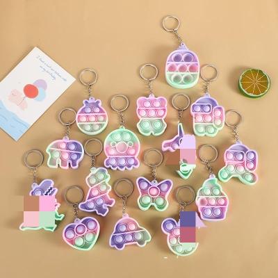 China Relieve Stress Mini Push Pop Patterned Silicone Stirring Person Toys Key Chain Anti-stress Silicone Sensory Bubbles Stir Key Chain For Adults for sale