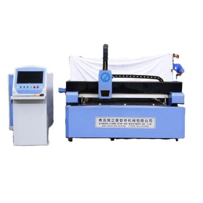 China Programmable CNC 3000w Fiber Laser Cutter Machine 1500mm x 3000mm Sheet Metal Cutting Machine for sale