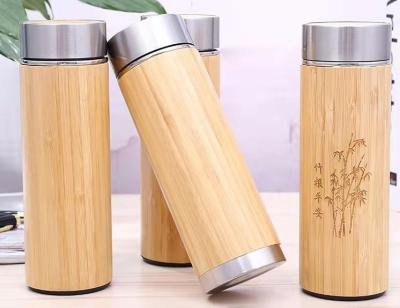 China Sustainable Stainless Steel Double Walled Bamboo Water Bottle Shell Thermal Bamboo Water Bottle With Wooden Lid for sale