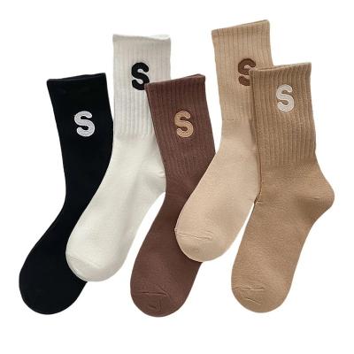 China Sports Women Letter Socks Fashion Cotton Socks Casual Long Students Sport Socks Solid Color for sale