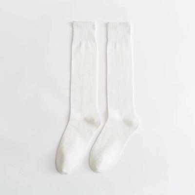 China Cotton jars women's calf's long socks knee length cotton solid color cotton socks girls college wind spring and summer in the long for sale