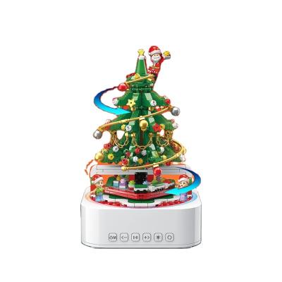 China Building Toy Rotating Xmas Tree Santa Scene Animated Custom Christmas Music Box Plastic Building Blocks Toys for sale