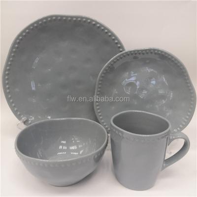 China Viable Custom Design Hot Sale Dinnerware Set 16pcs Embossed Irregular Shape Dinnerware Set Stoneware Ceramic Dinnerware Set for sale