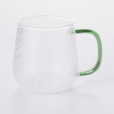 China Interesting Drinkware 420ML Borosilicate Glass Mug Coffee Mug Home Drinks Mug With Decorate Handle for sale