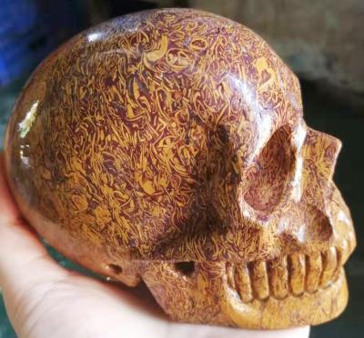 China China Gold Silk Jade With Beautiful Texture Skull Shape For Halloween Decoration for sale