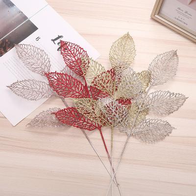 China Artificial Christams Home Decoration Christmas Gold Leaf Branch Decoration Simulation Leaves Plastic Tree Branches for sale