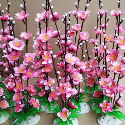 China Plum Blossom Winter Environmental Protection Artificial Flower Plastic Decor Creative Simulation Green Flower Home Decoration Ornaments For Gift for sale