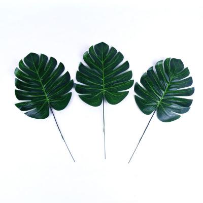 China Green Single Rod With Bone Monstera Leaf Artificial Flower Arrangement Environmental Protection Decorative Leaves For Home Decoration for sale