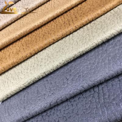 China Antistatic 100% Polyester Upholstery Suede Embossed Sofa Faux Leather Fabric for sale