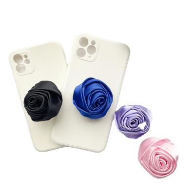 China Various Cartoon Flower Adjustable Phone Socket for sale